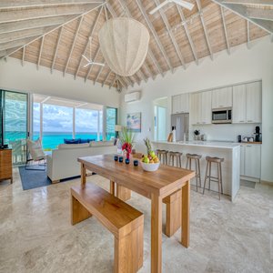 Three Bedroom Peninsula Oceanfront Coral Villa Dining Area