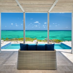 Three Bedroom Peninsula Oceanfront Coral Villa Outdoor Seating And View